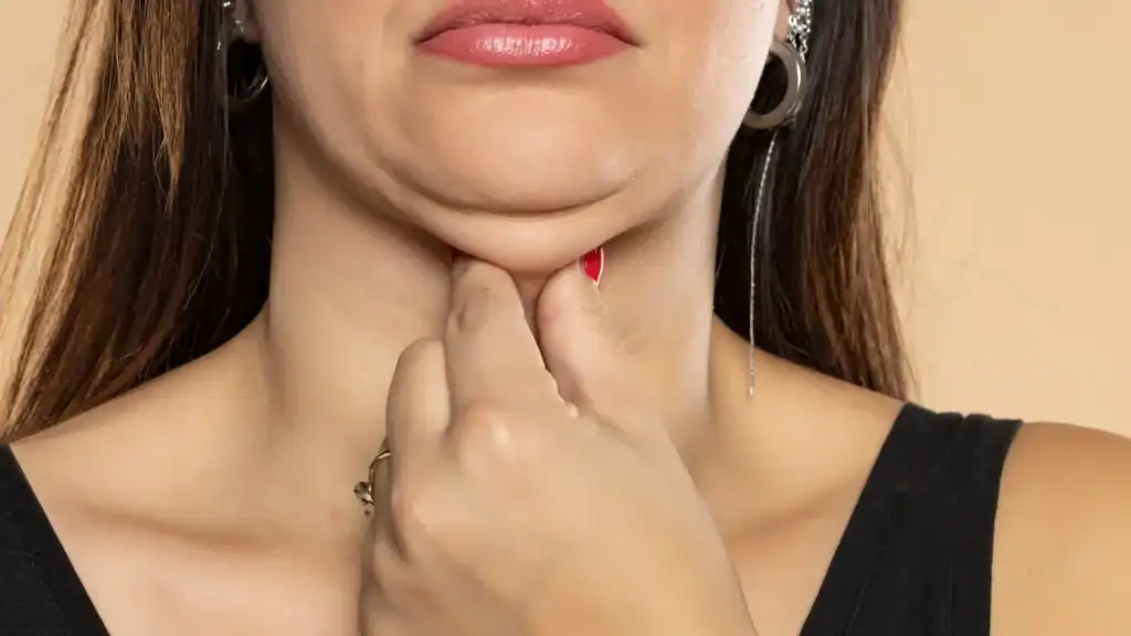 An image of a woman with double chin, sad, worried : Non Surgical Double Chin Removal Treatment in Princes Risborough, UK